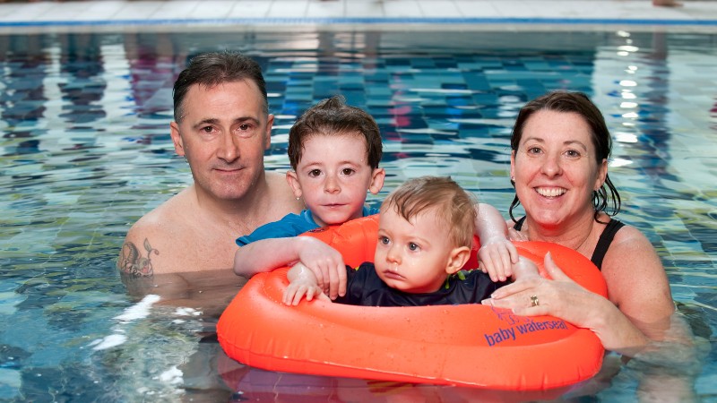 Family in a swimming pool