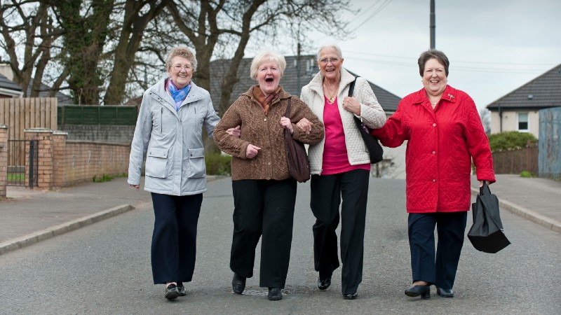 Women walking in road