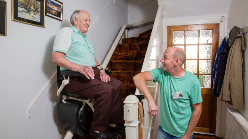 Man using a stairlift