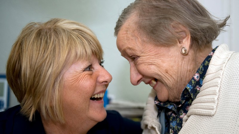 Two women looking at each other